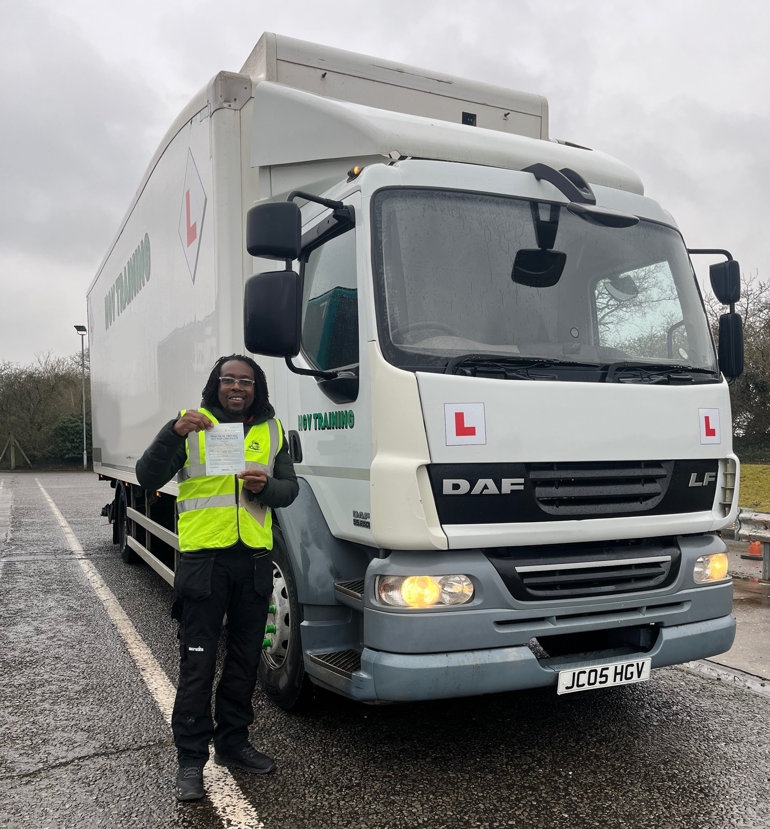 A blue rigid training truck