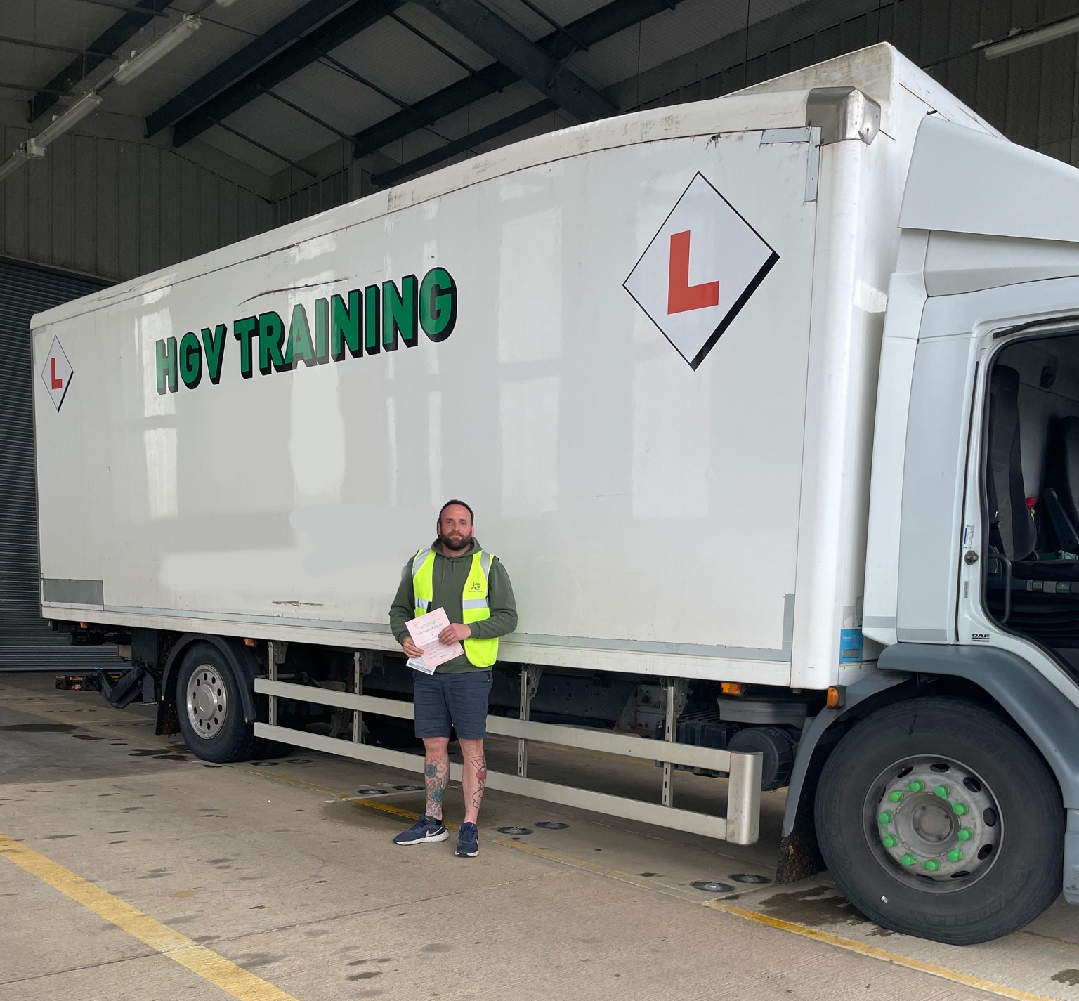 Side view of a blue training truck